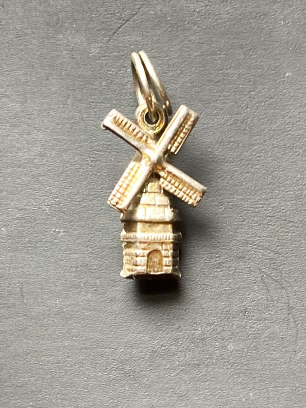 Silver windmill charm